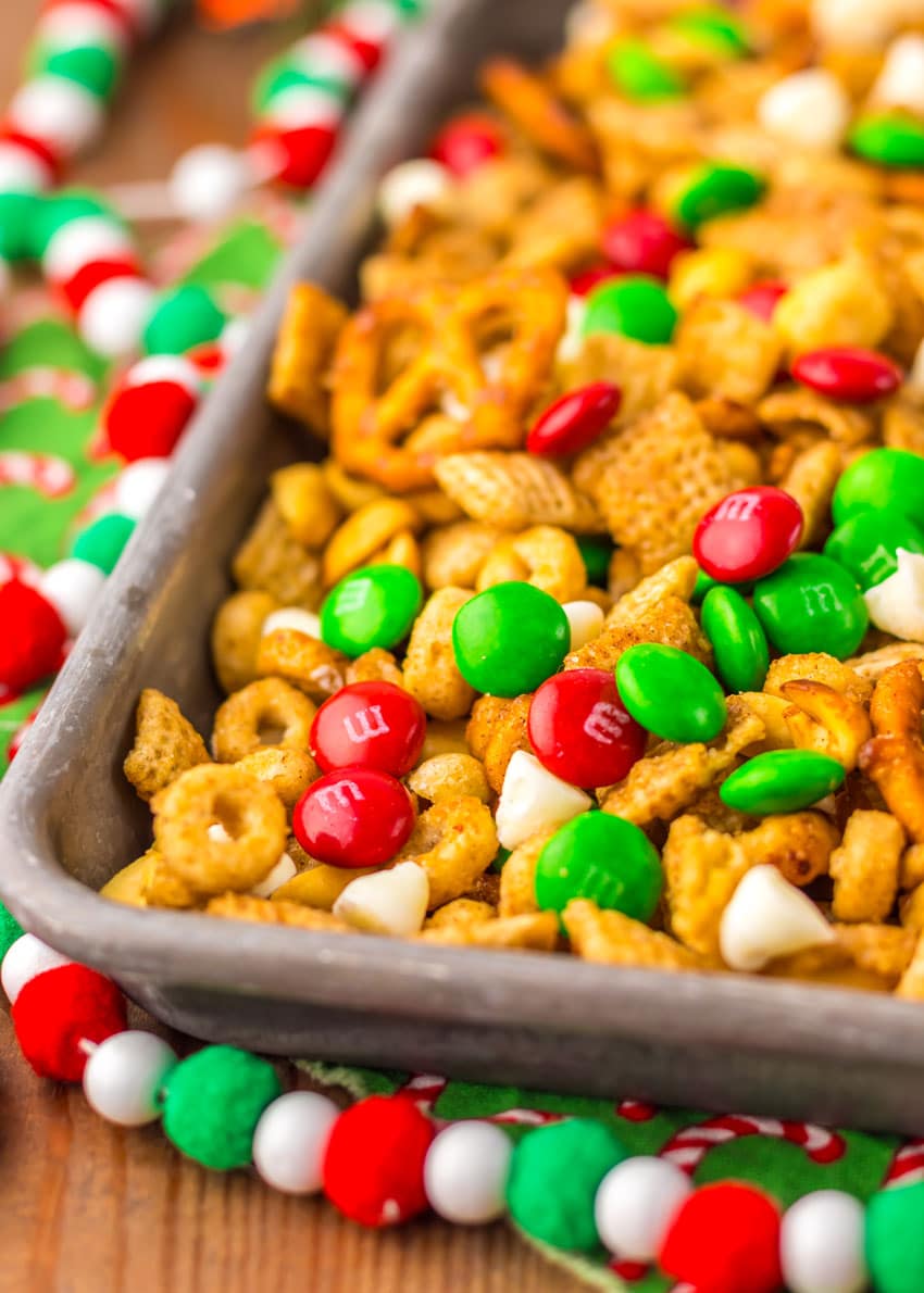 slow cooker christmas chex mix in a metal tray