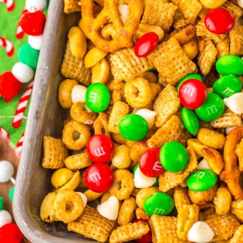 slow cooker christmas chex mix in a metal tray