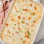 chicken cordon bleu lasagna in a white baking dish