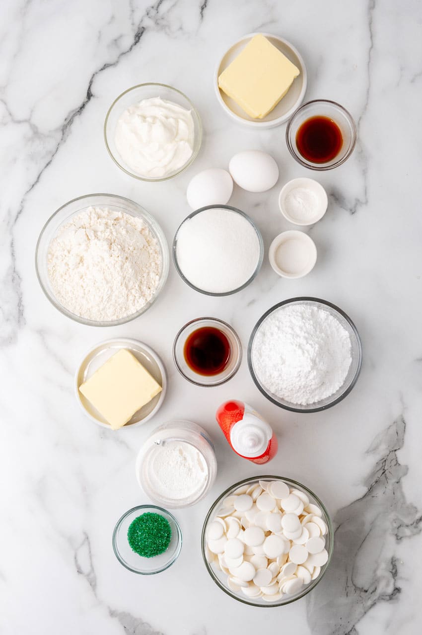 an overhead image showing the measured ingredients needed to make a batch of homemade little debbie christmas tree cakes