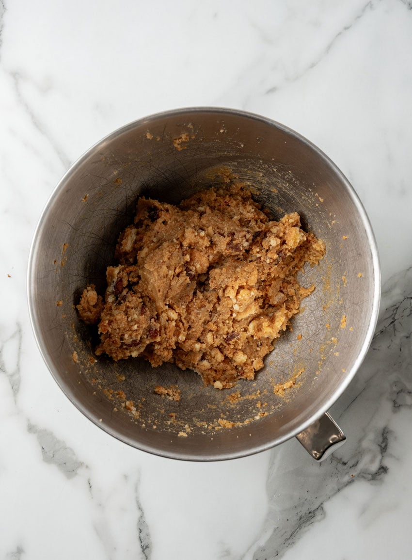 pecan pie truffle batter in a metal mixing bowl