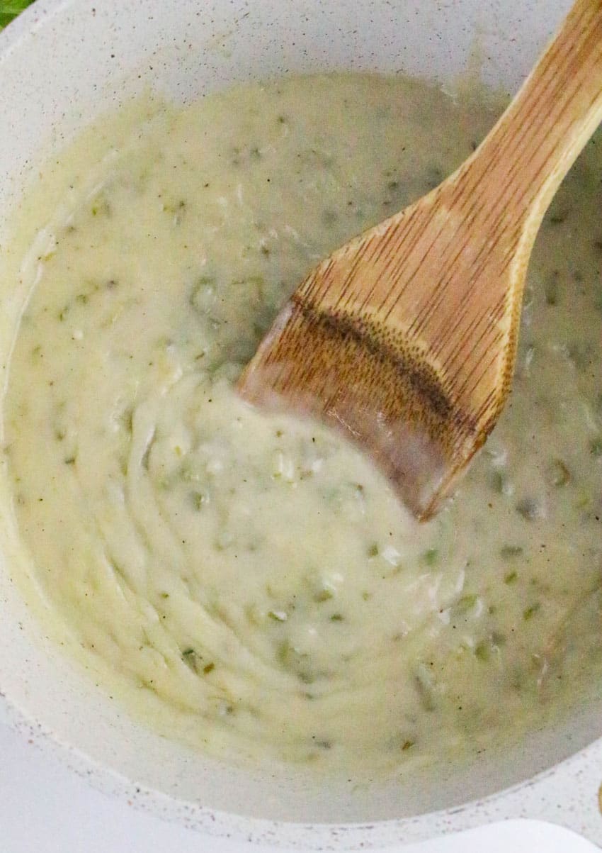 homemade condensed cream of celery soup in a white pot