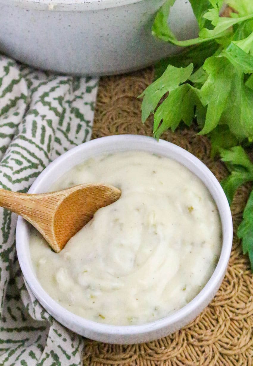 homemade condensed cream of celery soup in a small white bowl