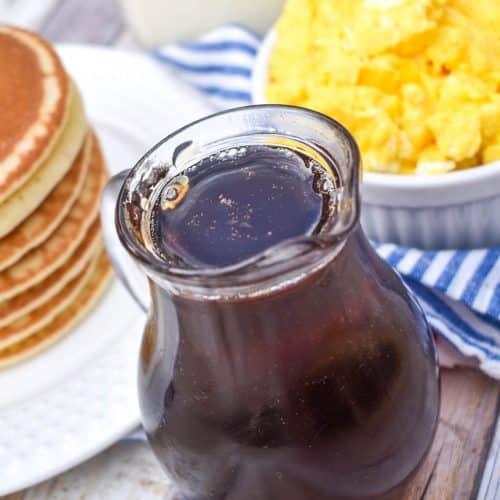 homemade maple syrup in a small glass pitcher