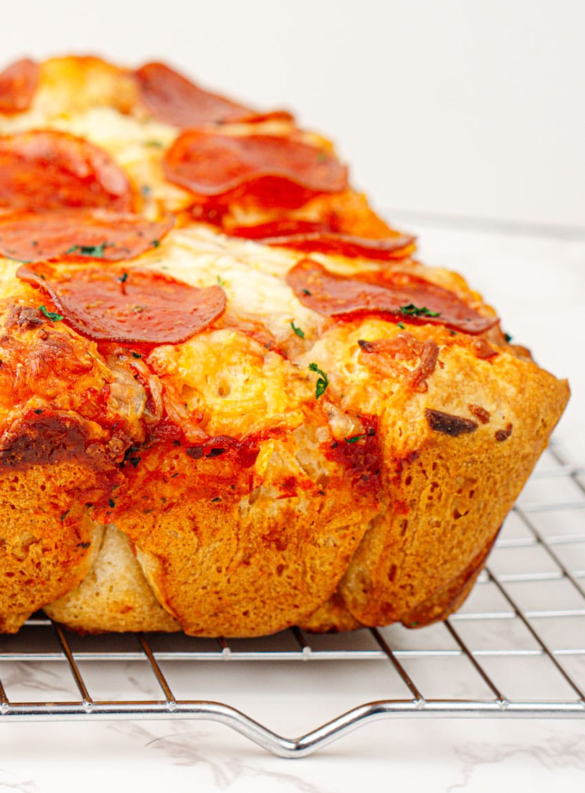 a bubble up pizza casserole cooling on a wire rack