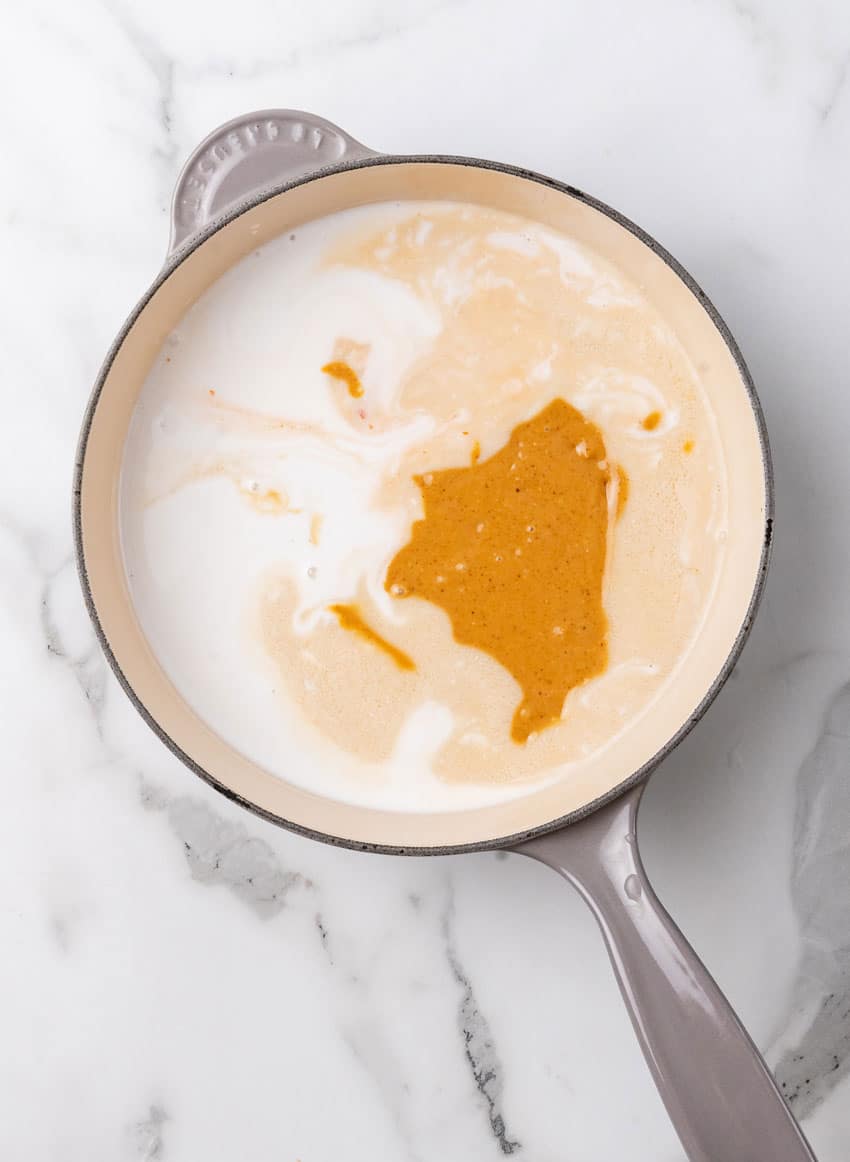 homemade asian peanut sauce ingredients in a large skillet