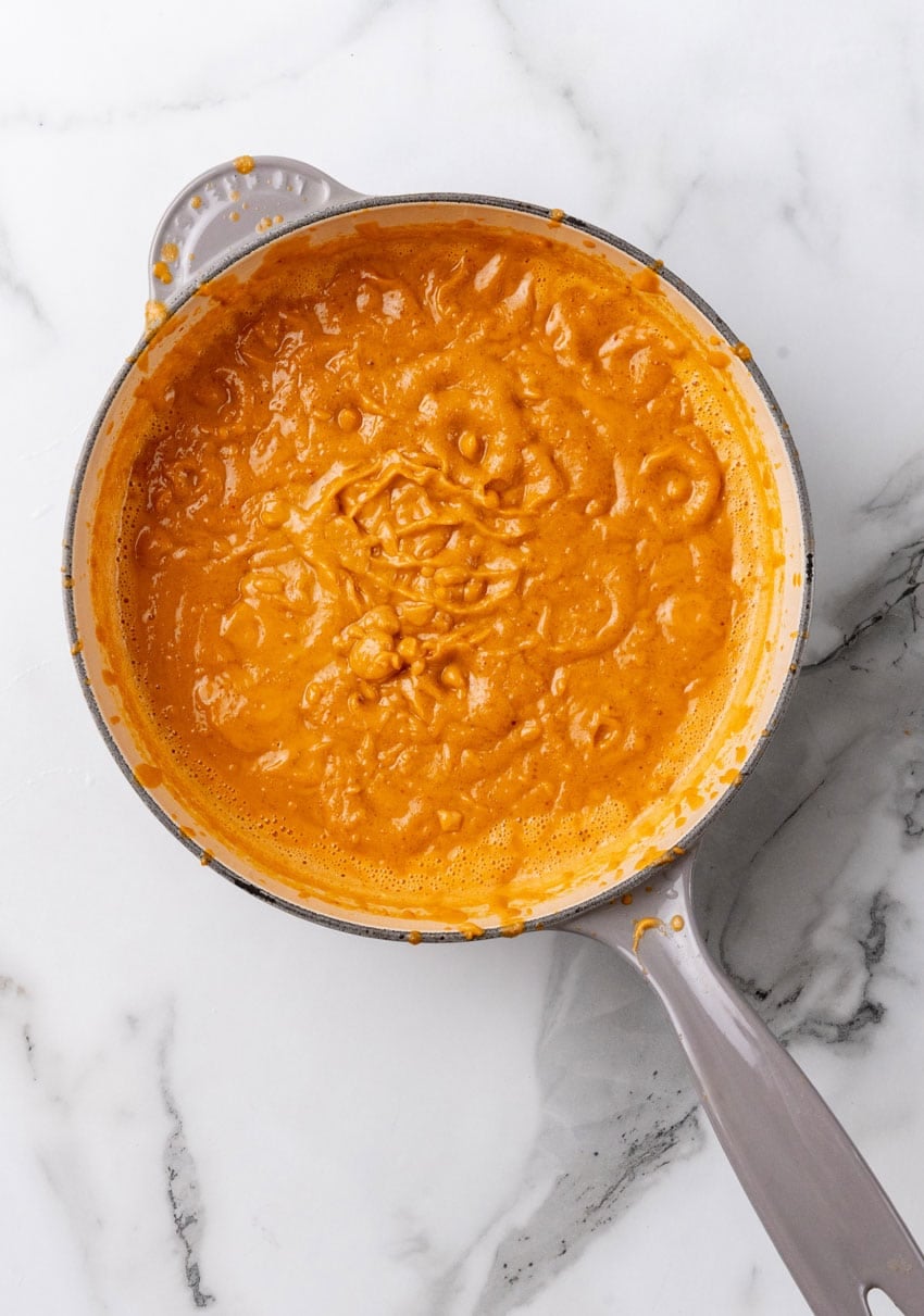 homemade asian peanut sauce in a large gray skillet