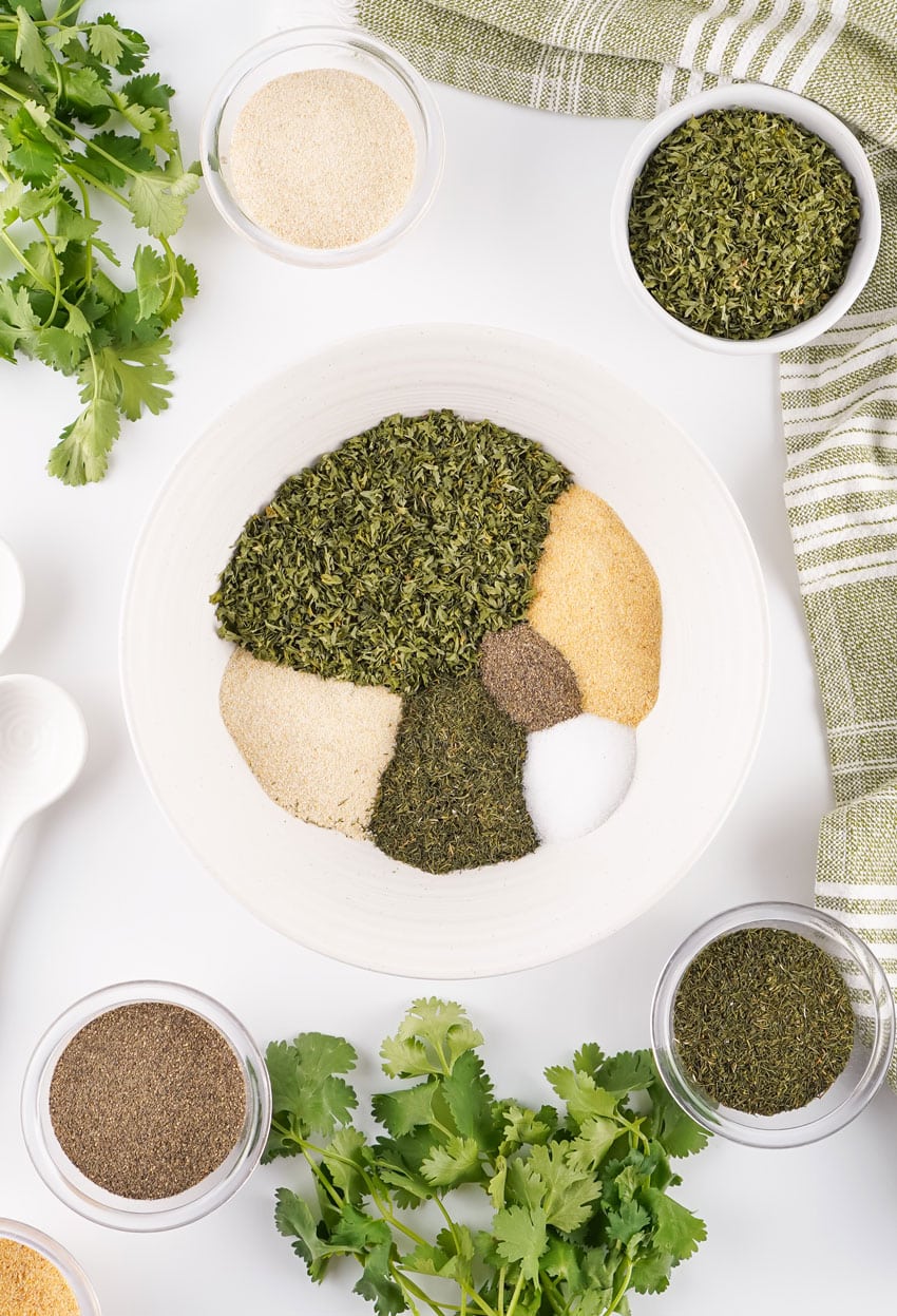 homemade ranch seasoning mix ingredients in a small white bowl