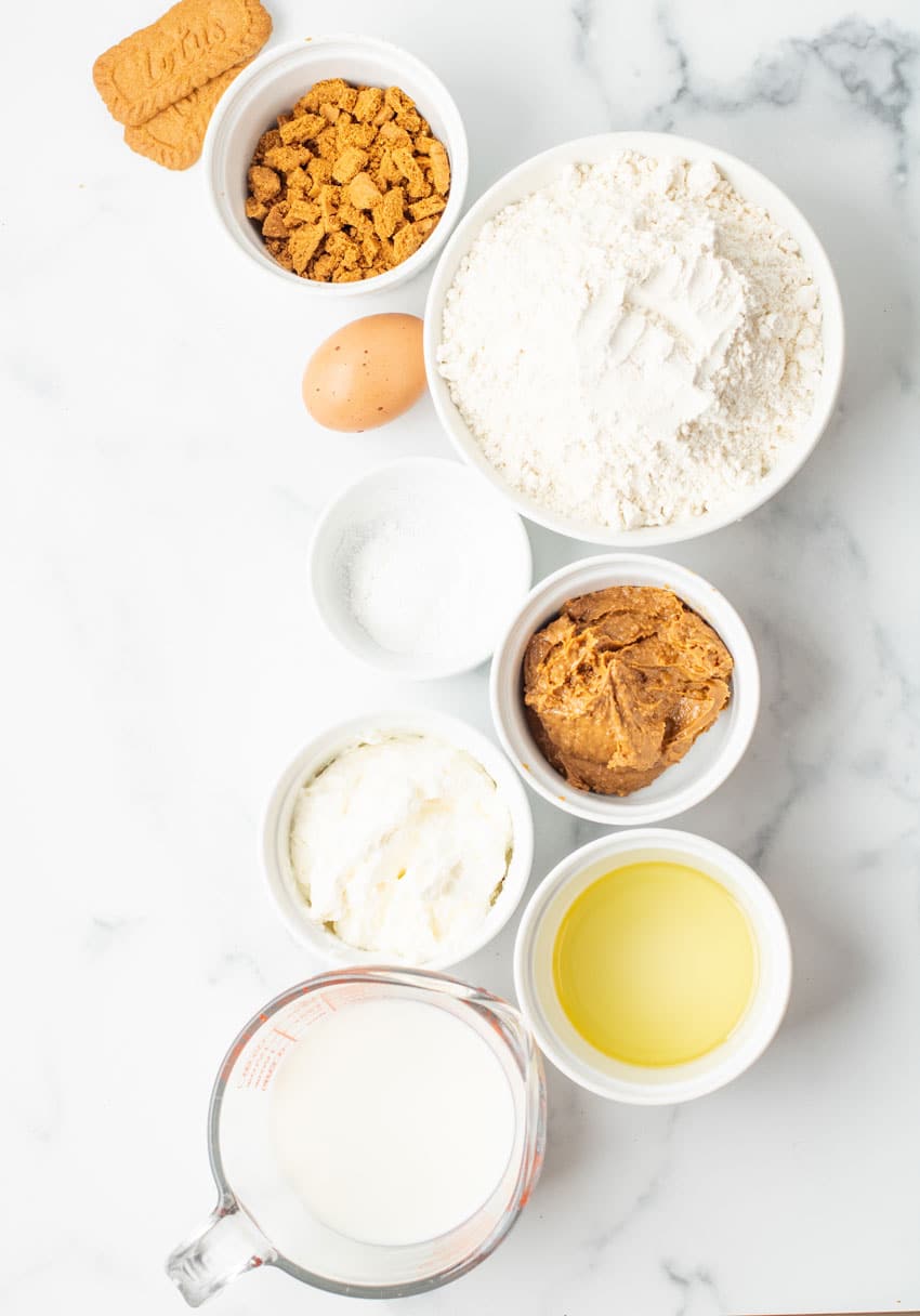 an overhead image showing the measured ingredients needed to make a batch of cookie butter pancakes