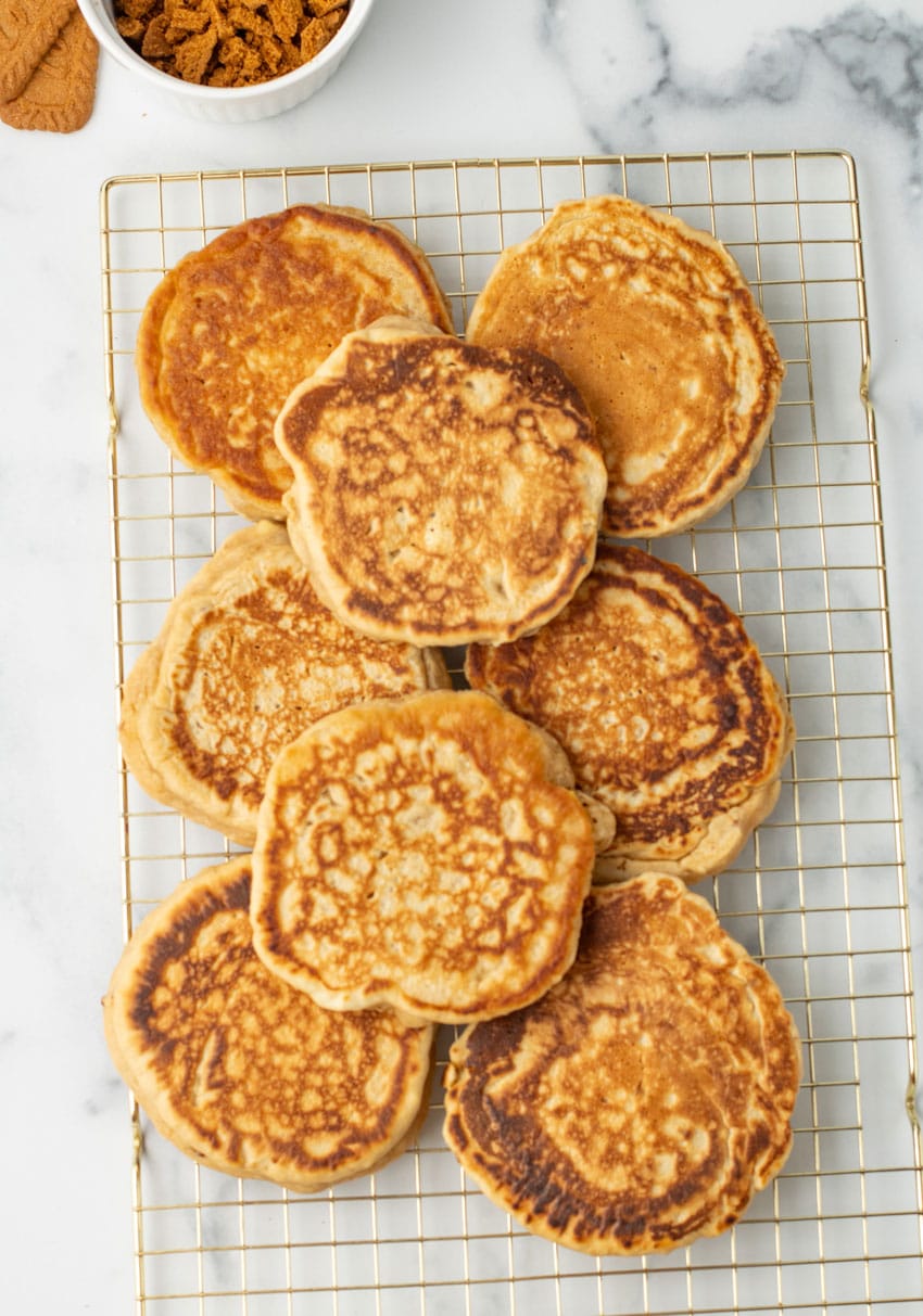 cookie butter pancakes cooling on a wire rack