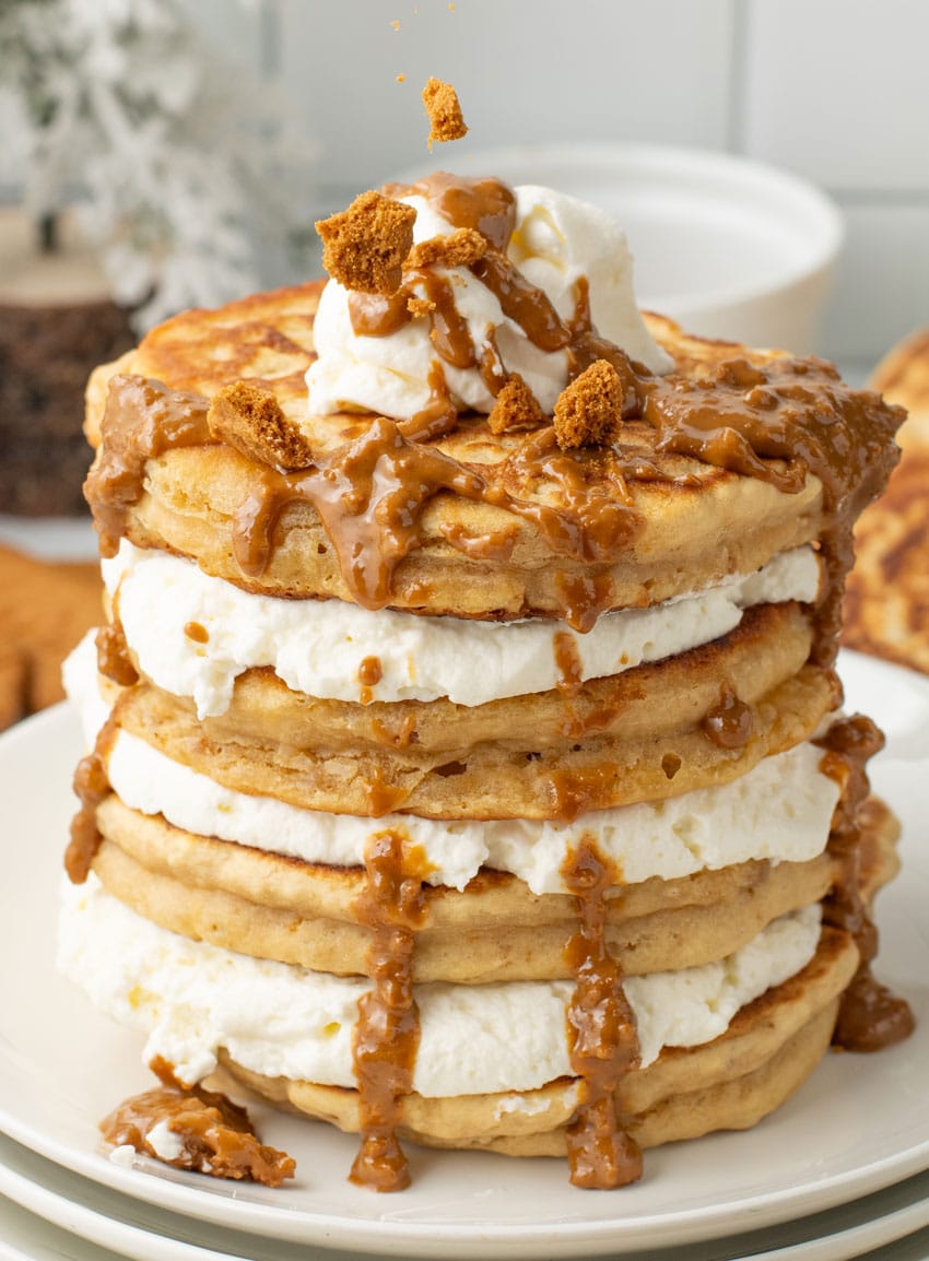a stack of cookie butter pancakes on a white plate