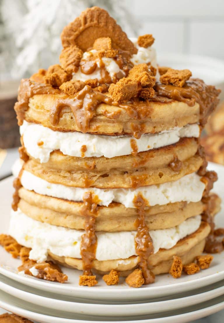 a stack of cookie butter pancakes on a white plate