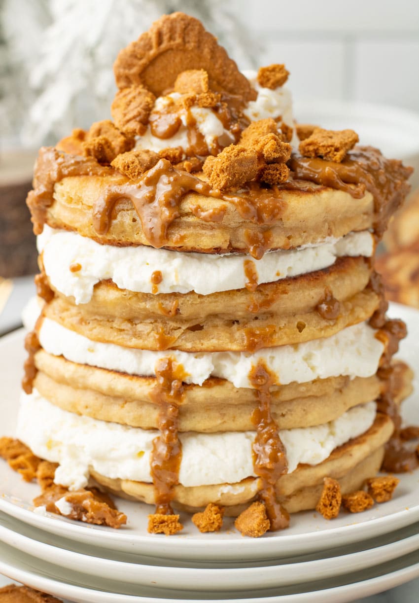 a stack of cookie butter pancakes on a white plate