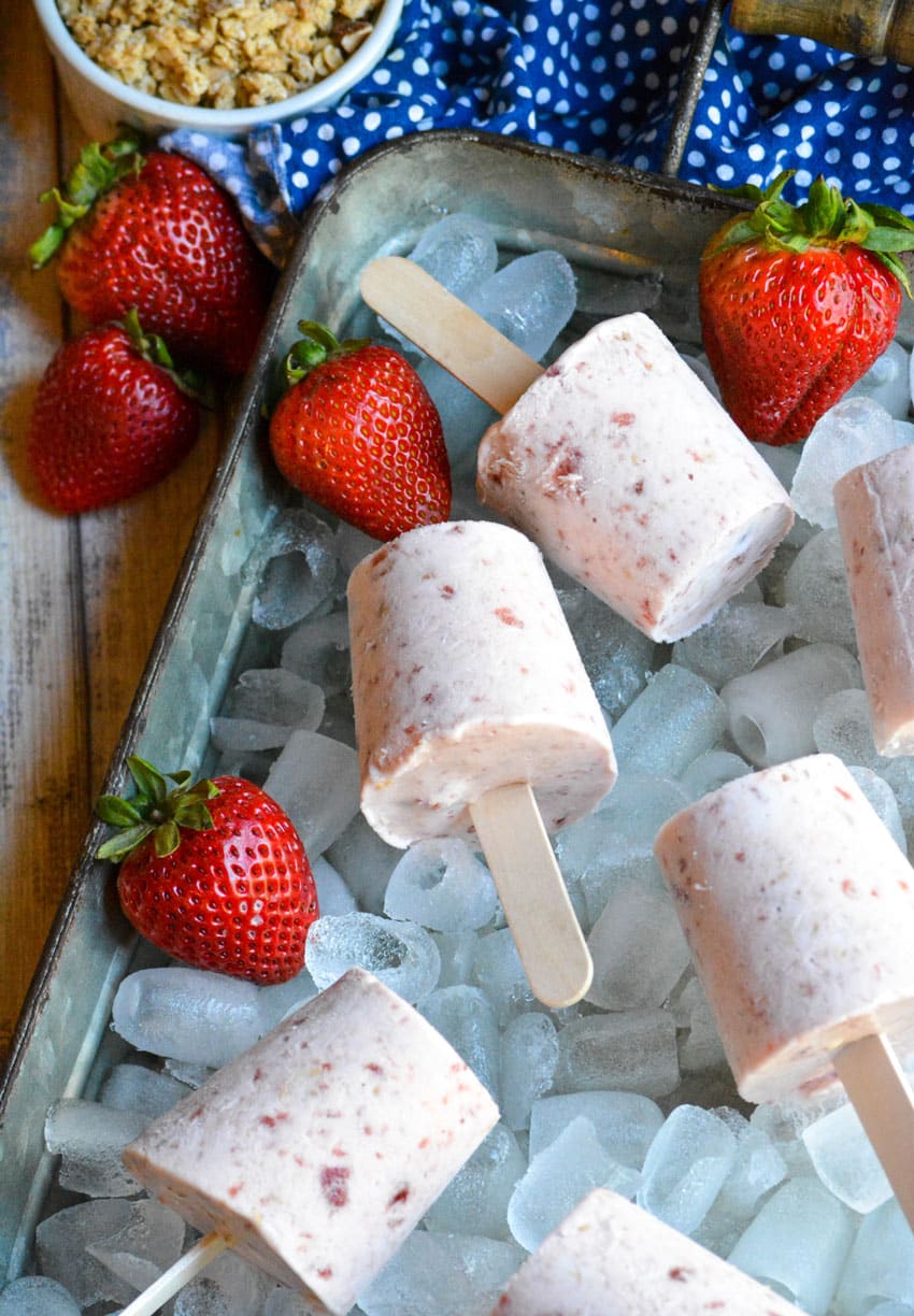 strawberry cobbler pops on a bed of ice
