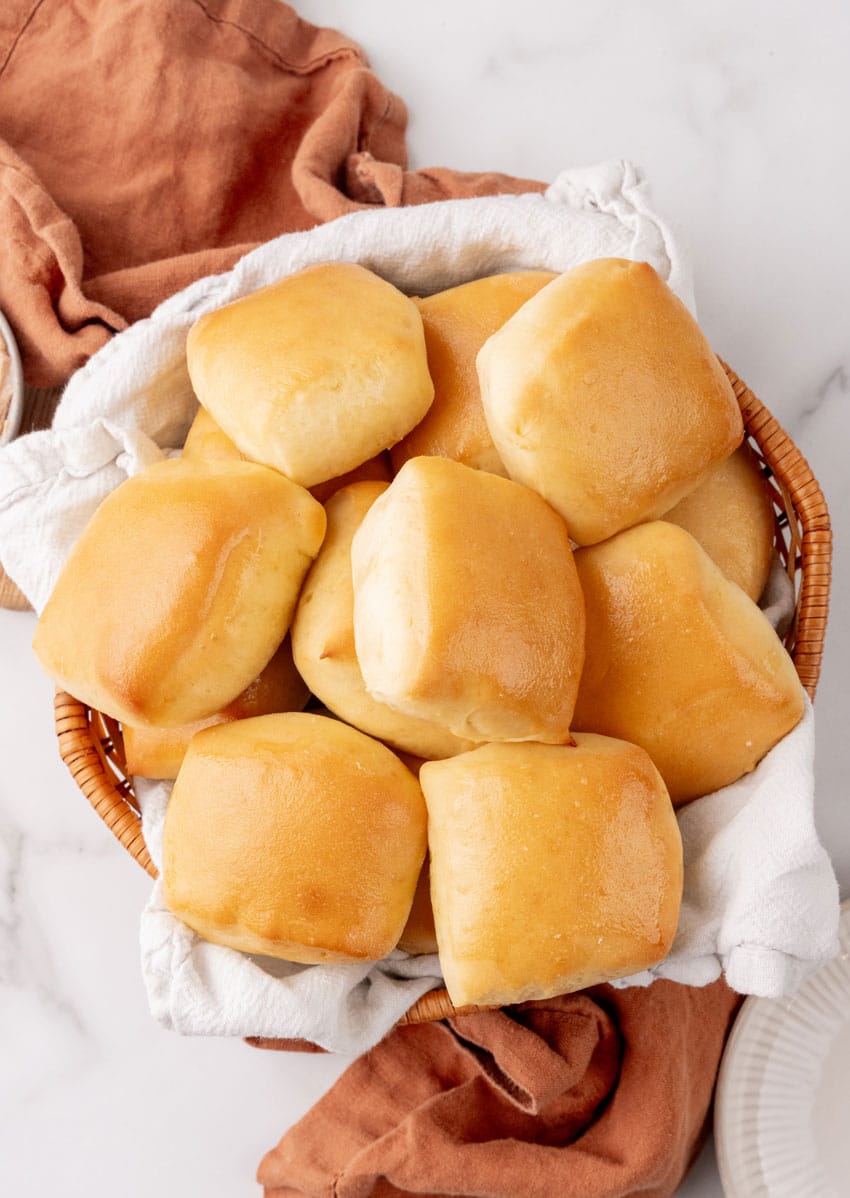copycat texas roadhouse rolls in a cloth lined bread basket