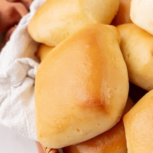 copycat texas roadhouse rolls in a cloth lined bread basket