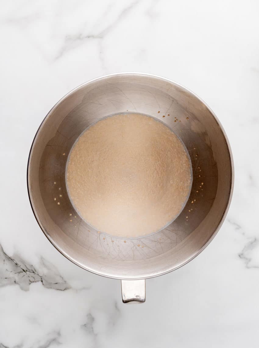 proofed yeast in a metal mixing bowl