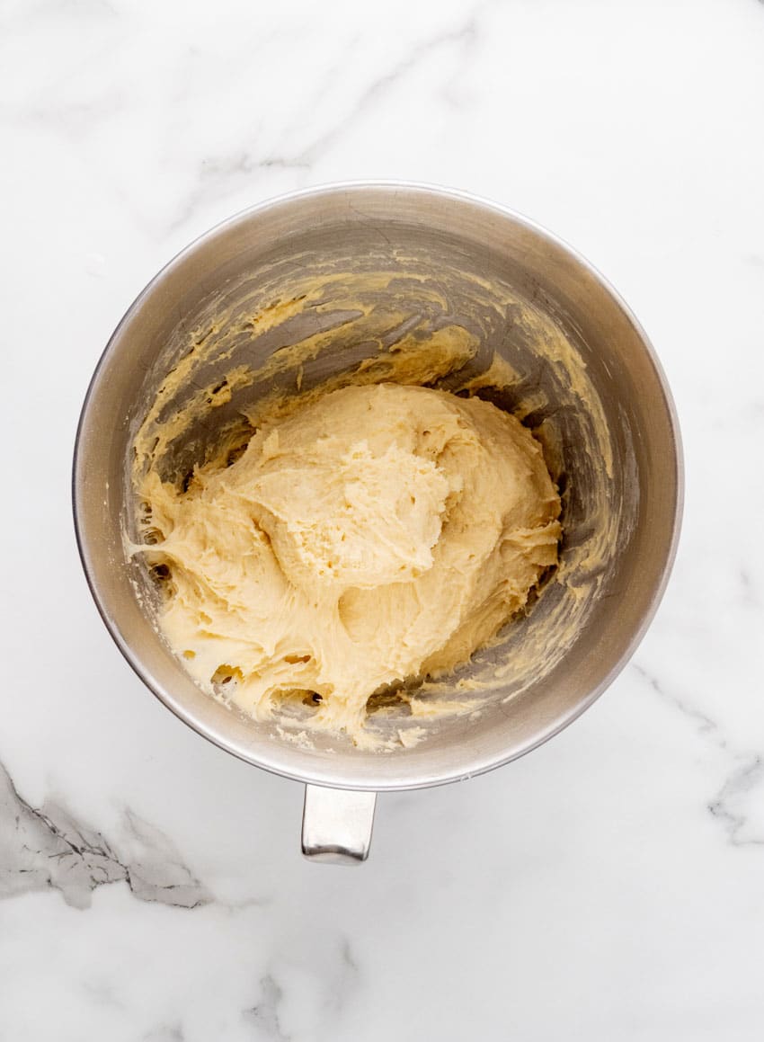 copycat texas roadhouse roll dough in a metal mixing bowl