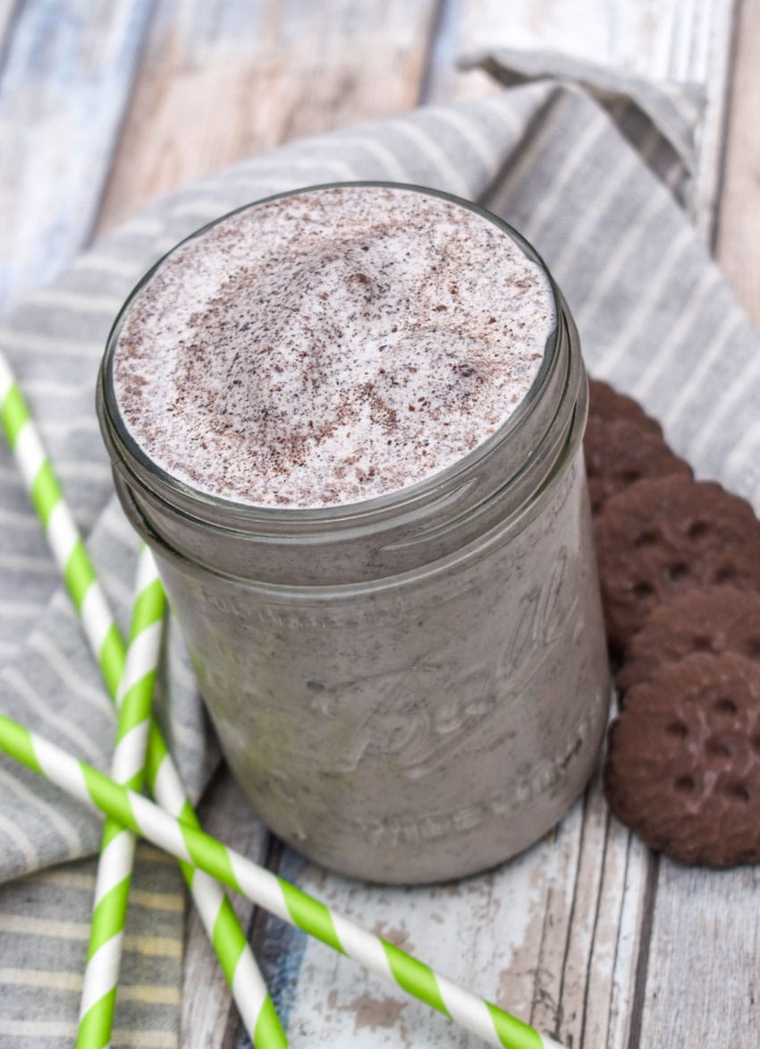 a homemade thin mint girl scout cookie in a small glass jar