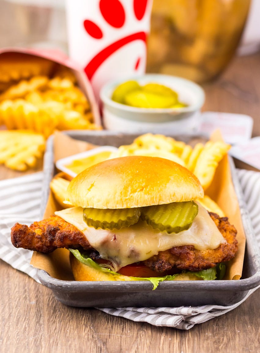 a copycat Chick Fil A spicy deluxe sandwich on a metal tray