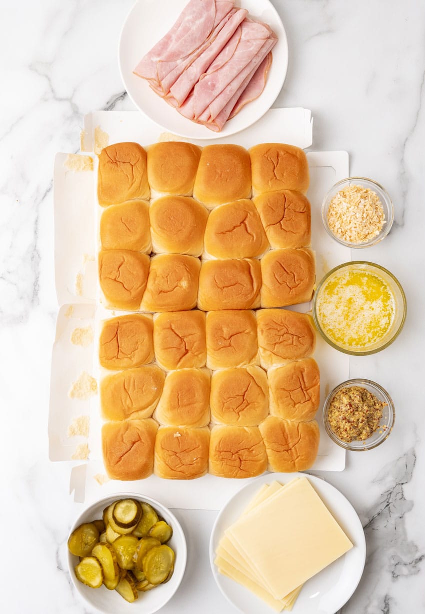 an overhead image showing the measured ingredients needed to make a batch of homemade cuban style sliders