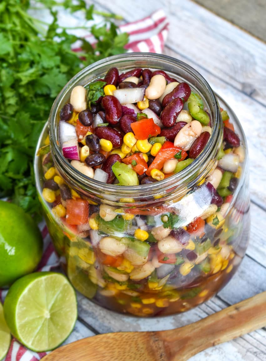 Mexican three beans salad in a glass mason jar