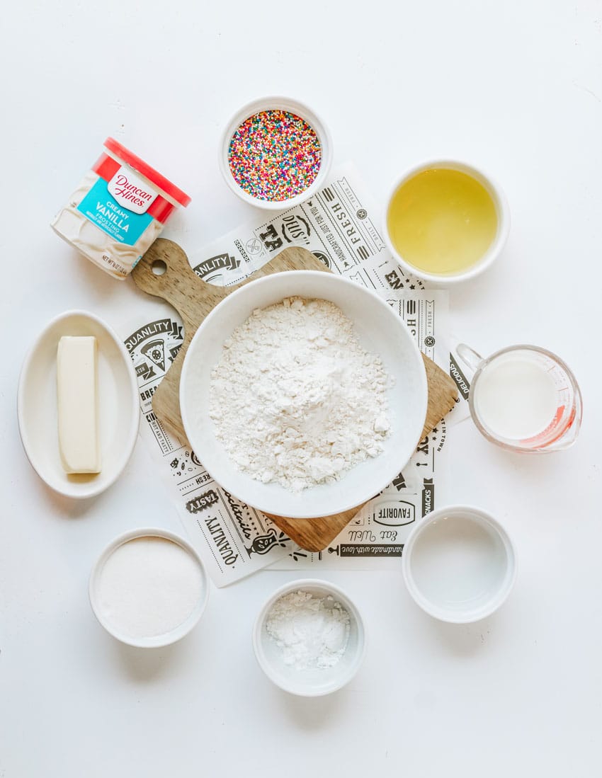 an overhead image showing the measured ingredients needed to make individual homemade dot cakes