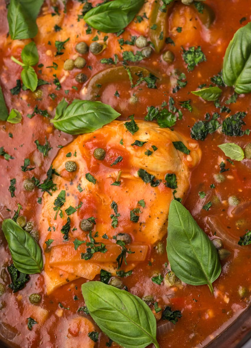 easy chicken cacciatore in the black bowl of a slow cooker
