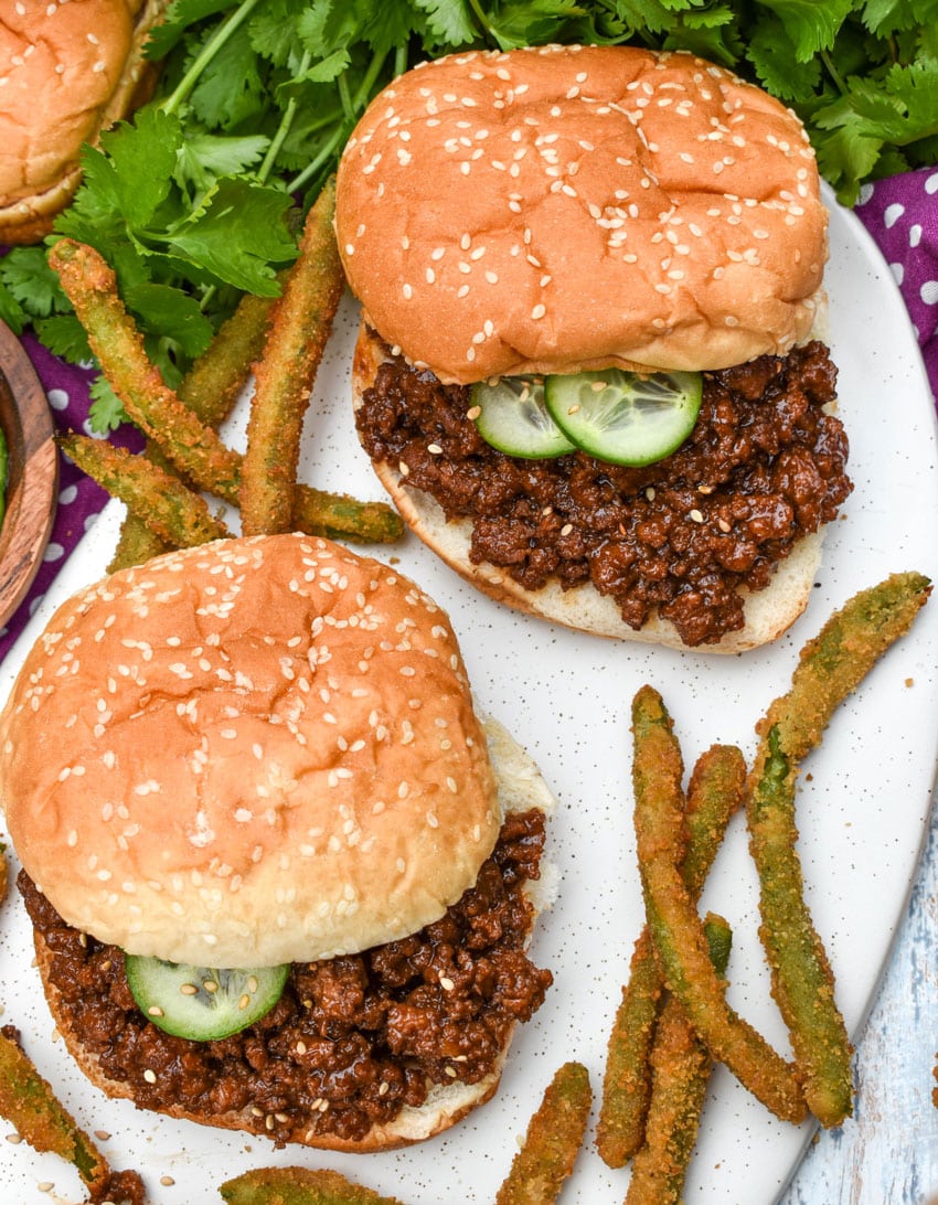 asian sloppy joes and green bean fries on a white serving platter