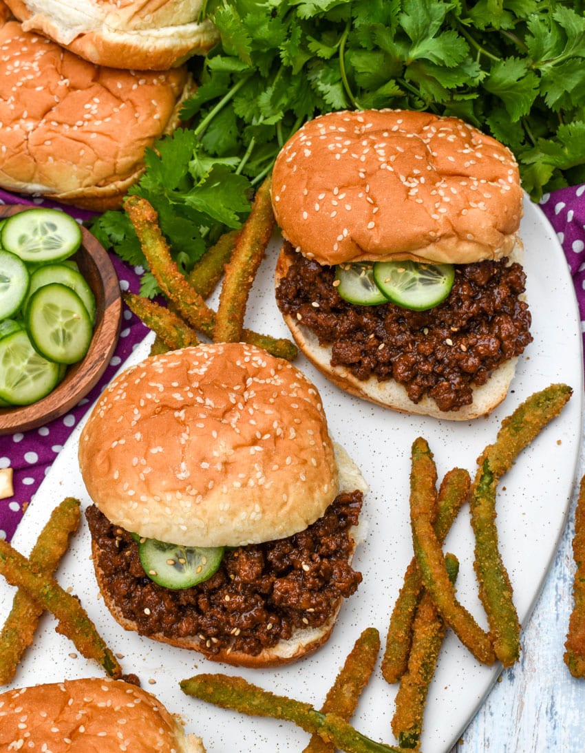 asian sloppy joes and green bean fries on a white serving platter