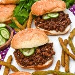 asian sloppy joes and green bean fries on a white serving platter