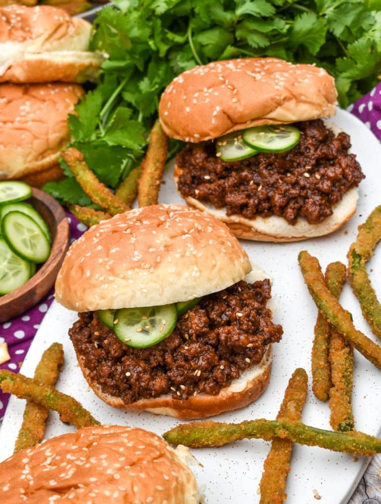 asian sloppy joes and green bean fries on a white serving platter