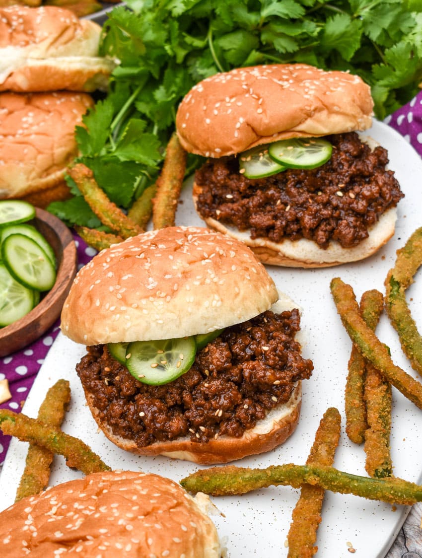 asian sloppy joes and green bean fries on a white serving platter