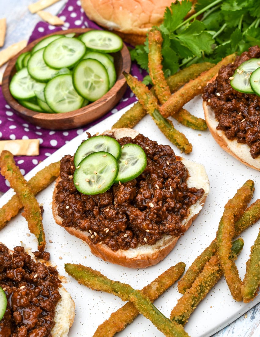 asian sloppy joes and green bean fries on a white serving platter