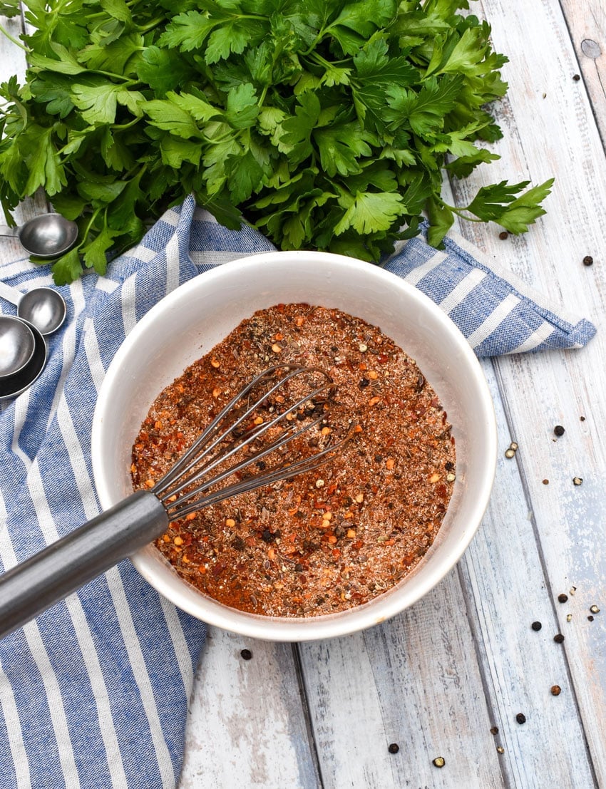 copycat montreal steak seasoning ingredients in a white bowl