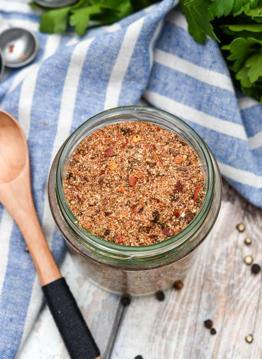 homemade montreal steak seasoning in a small glass jar