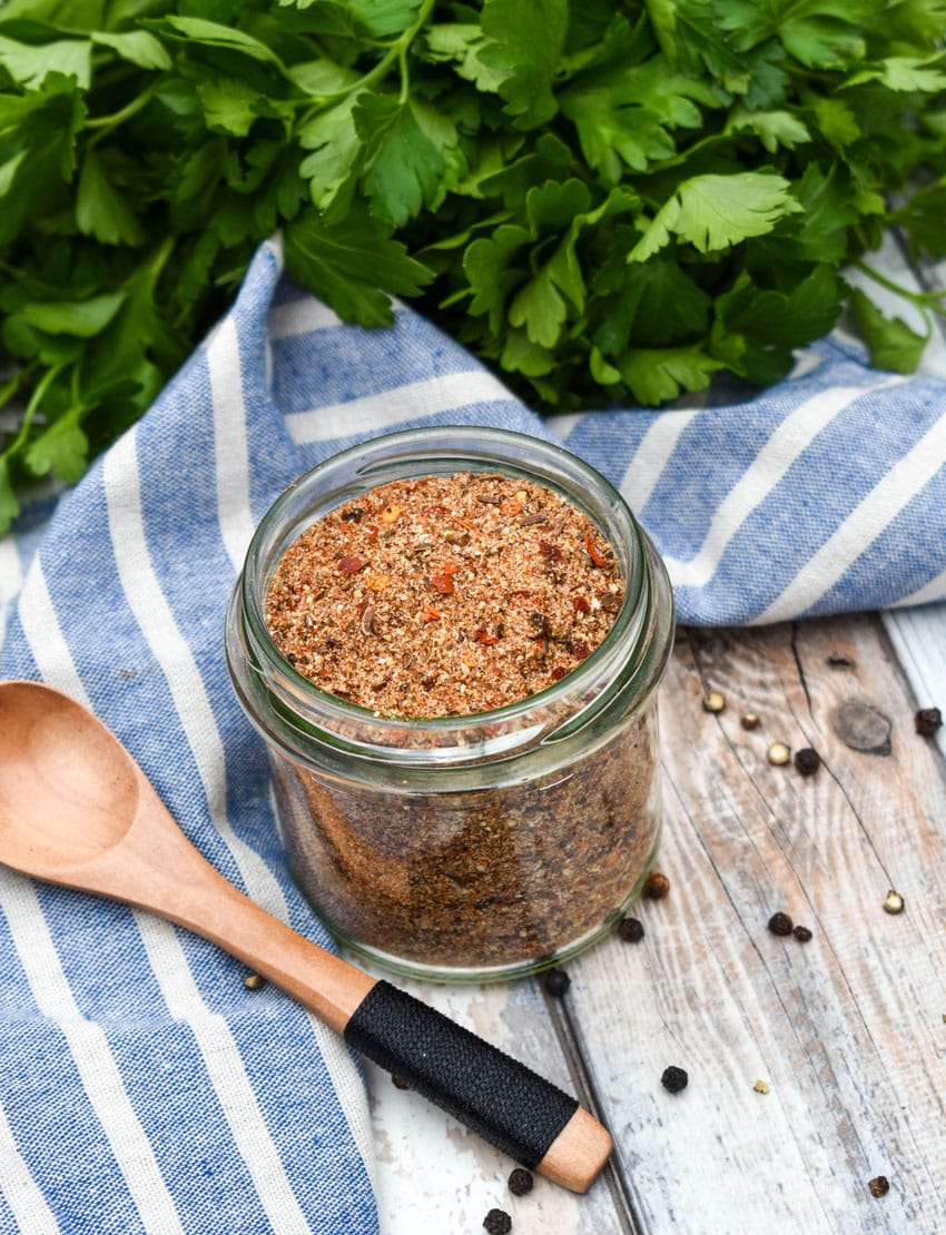 homemade montreal steak seasoning in a small glass jar