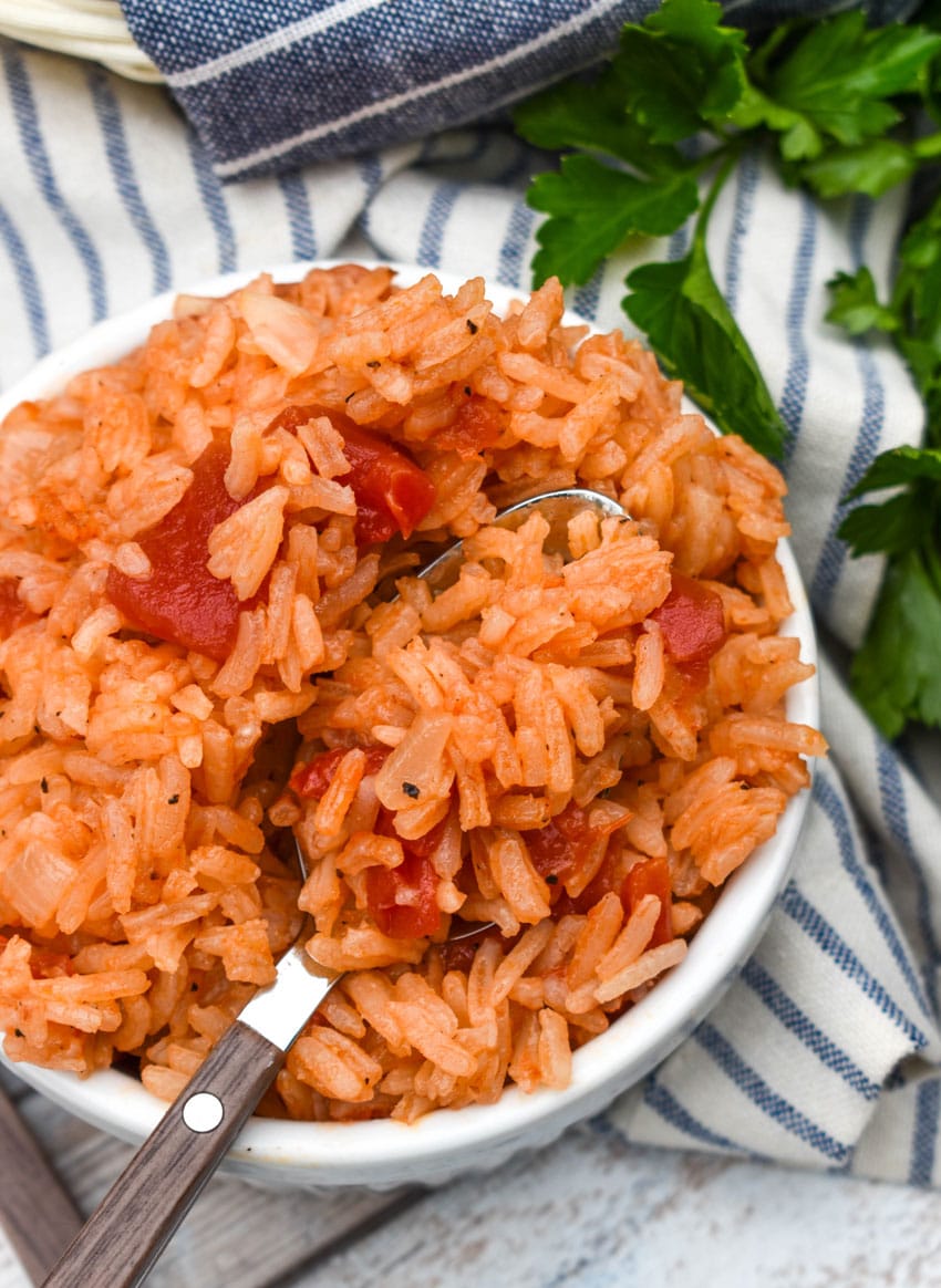 southern tomatoes and rice in a small white ramekin