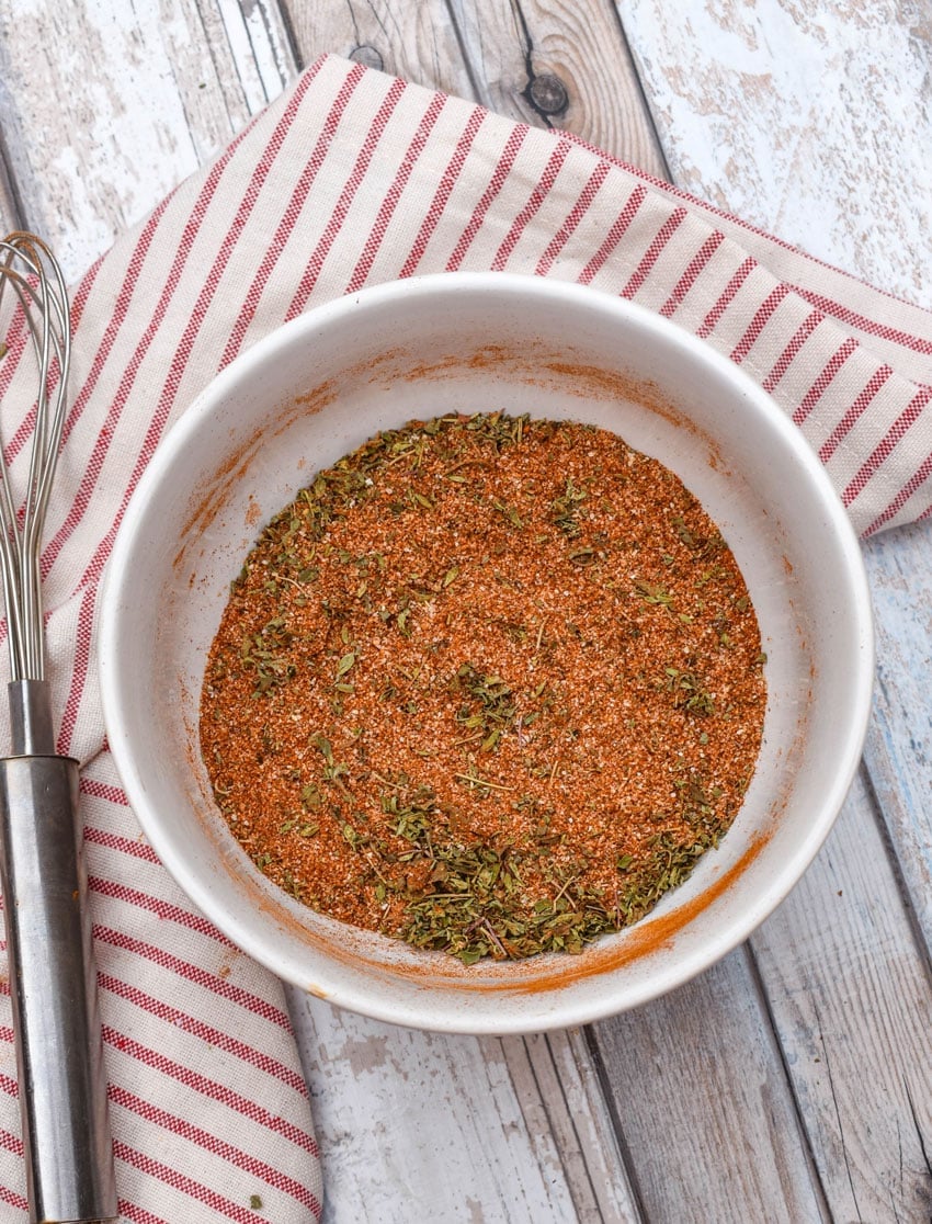 a blend of homemade seasonings in a small white bowl