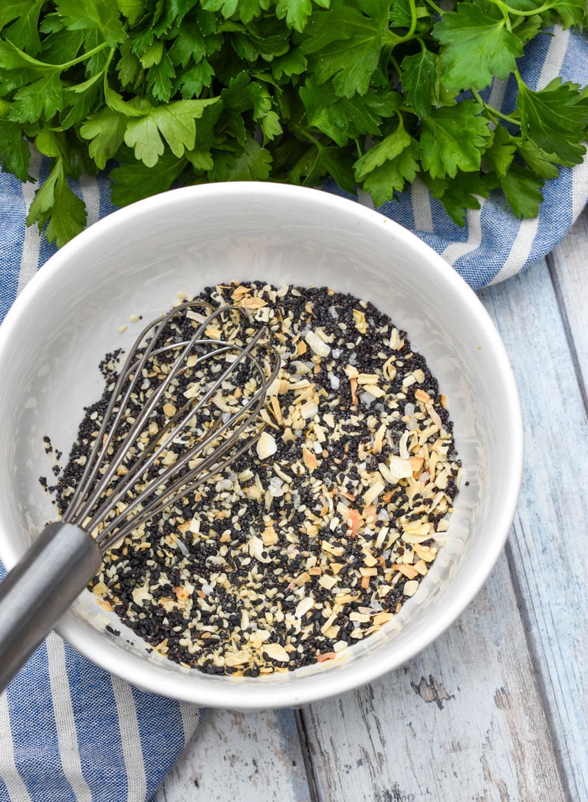 homemade everything bagel seasoning ingredients in a small white bowl