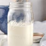 homemade sour cream in a large glass mason jar