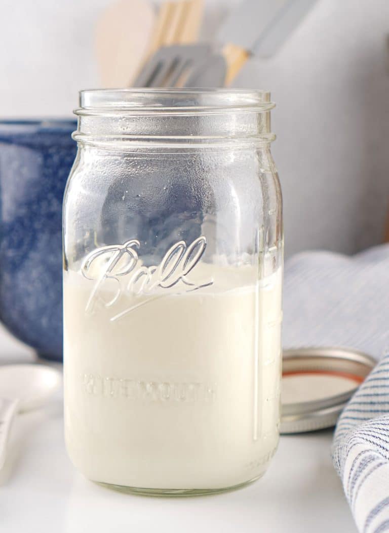 homemade sour cream in a large glass mason jar