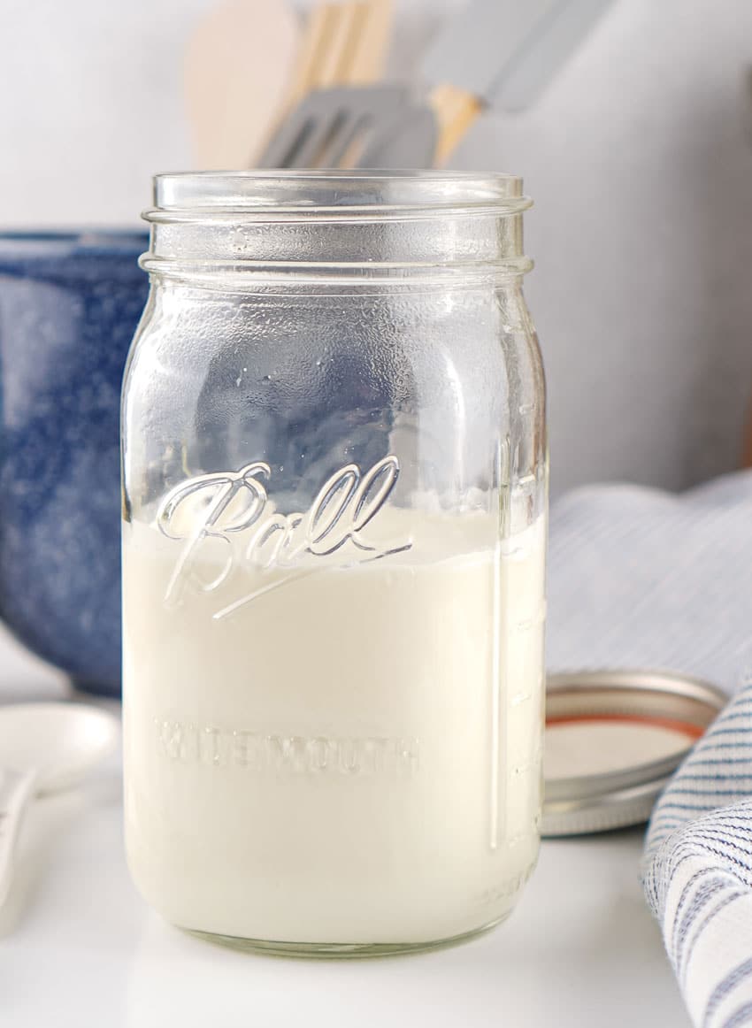 homemade sour cream in a large glass mason jar