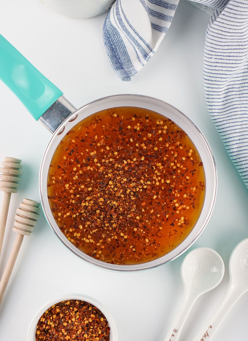 homemade hot honey ingredients in a small kitchen pot