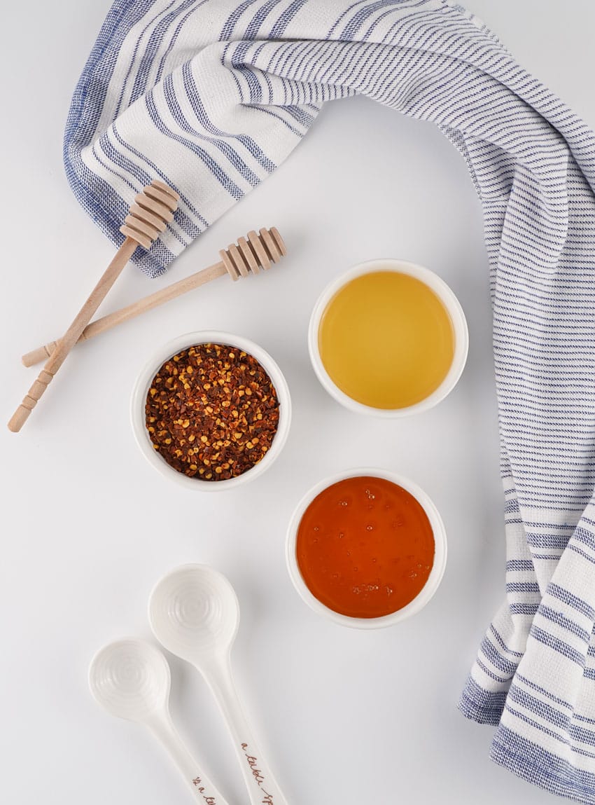 an overhead image showing the measured ingredients needed to make a batch of homemade hot honey