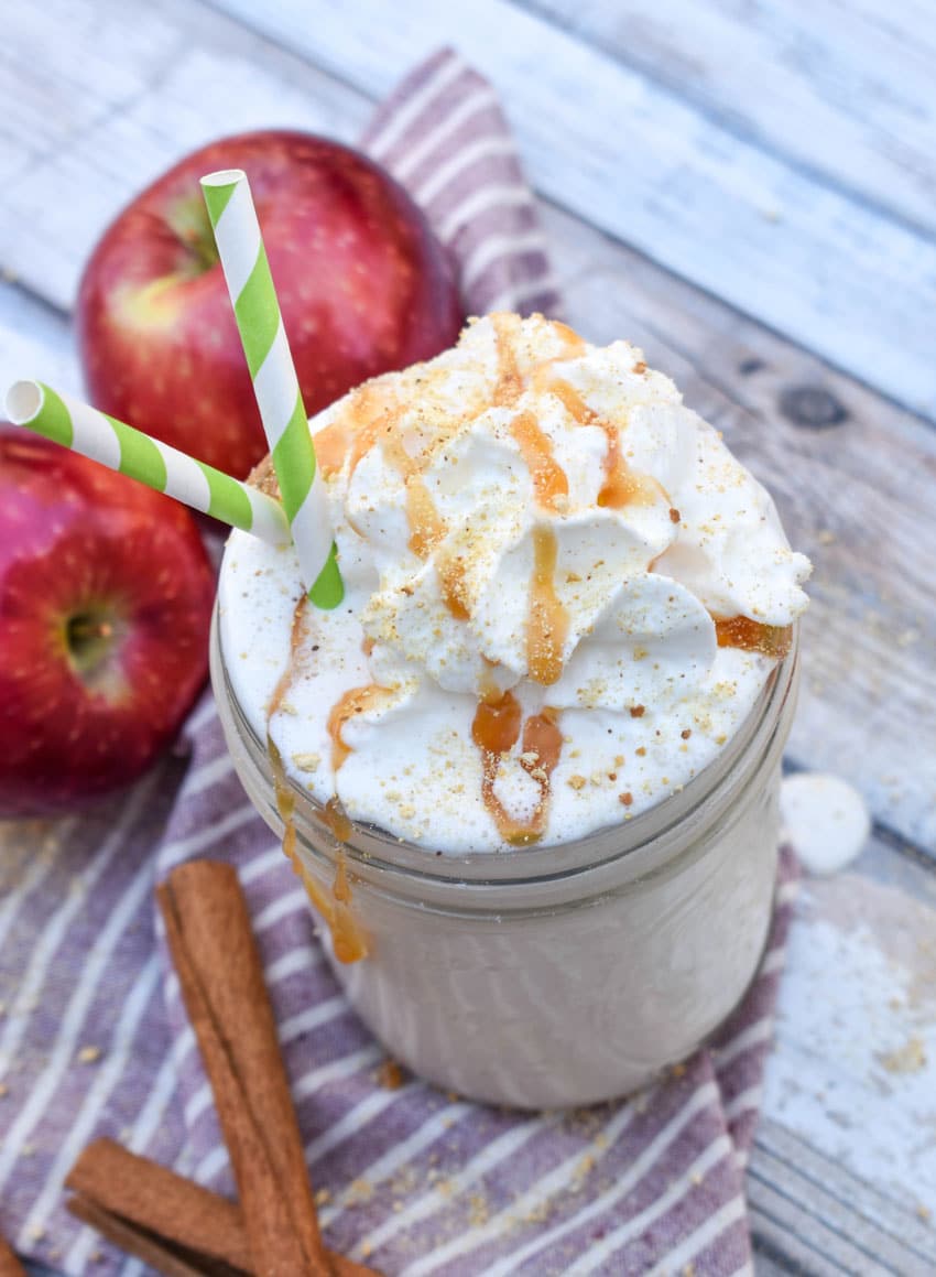 an apple pie milkshake in a small glass jar