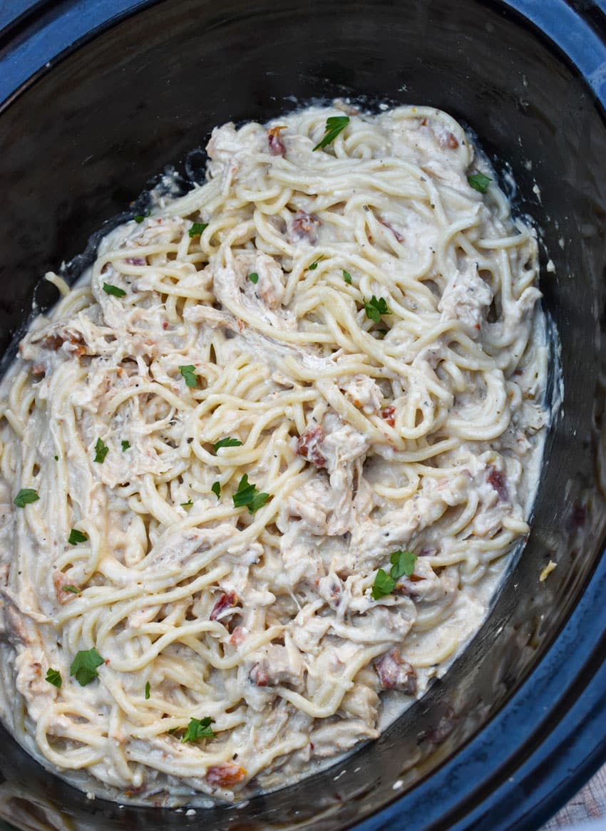 marry me chicken spaghetti in the black crock of a slow cooker