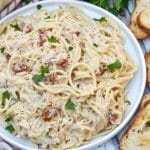 slow cooker marry me chicken on a white dinner plate