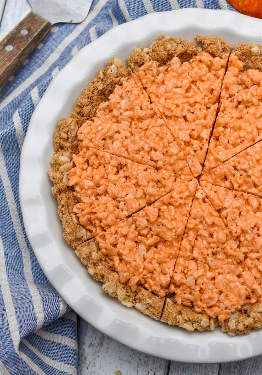 pumpkin pie rice krispie treats in a white pie dish