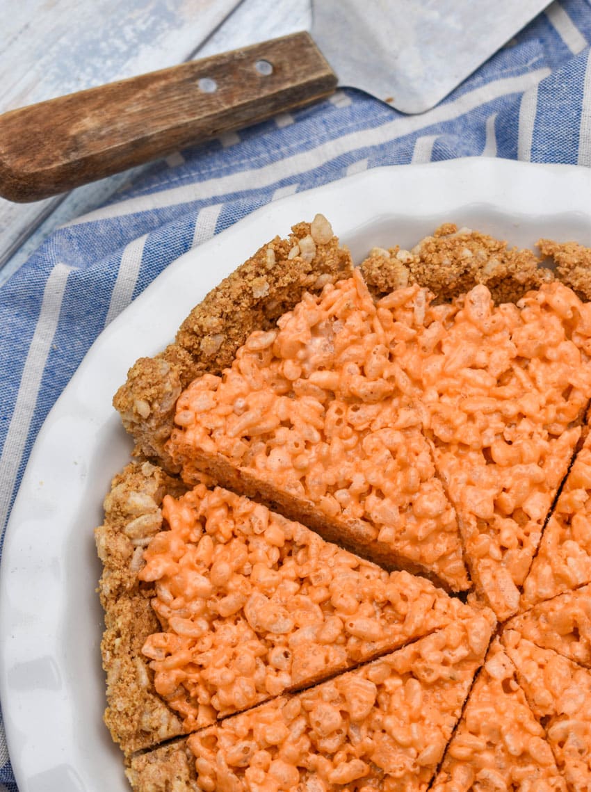 pumpkin pie rice krispie treats in a white pie dish